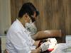 معاینه و درمان با لیزر در کلینیک دندانپزشکی جهاددانشگاهی مشهد